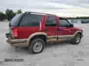 1999 Chevrolet Blazer LS с VIN 1GNCS13WXX2126904, выставлен на аукционе Copart как лот 69987244 с пробегом 384 028 миль миль и Списание • Salvage title. История ставок и продаж доступна на DreamBid. Изображение 3.