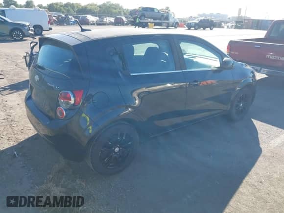 2013 Chevrolet Sonic LT с VIN 1G1JC6SH1D4154113, выставлен на аукционе IAAI как лот 43419607 с пробегом 138 983 миль миль и . История ставок и продаж доступна на DreamBid. Изображение 4.