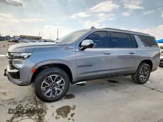 2022 Chevrolet Suburban Z71 с VIN 1GNSKDKD2NR270108, выставлен на аукционе Copart как лот 70195135 с пробегом 73 877 миль миль и Списание • Salvage title. История ставок и продаж доступна на DreamBid. Изображение 1.