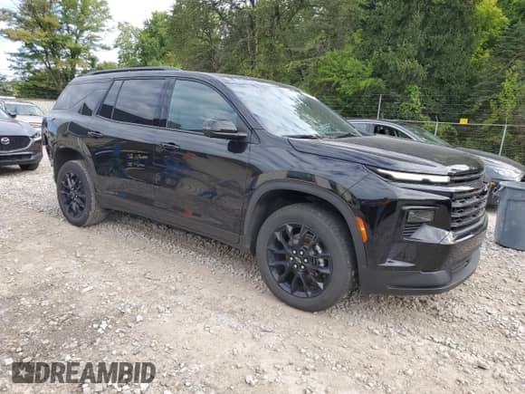 2024 Chevrolet Traverse FWD LT with VIN 1GNERGKS4RJ152865, listed as a Copart auction lot 69911185 with 26,692 mi miles and Salvage title. Bid and sale history available at DreamBid. Image 4.