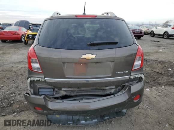 2014 Chevrolet Captiva Sport LT с VIN 3GNAL3EK3ES664582, выставлен на аукционе Copart как лот 81323704 с пробегом 168 689 миль миль и Списание • Salvage title. История ставок и продаж доступна на DreamBid. Изображение 6.