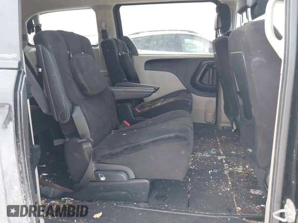 2014 Dodge Grand Caravan SXT with VIN 2C4RDGBGXER138141, listed as a IAAI auction lot 41201505 with 156,445 mi miles and . Bid and sale history available at DreamBid. Image 8.