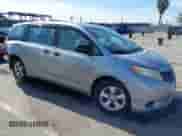 2013 Toyota Sienna L with VIN 5TDZK3DC4DS308136, listed as a IAAI auction lot 43009117 with 156,924 mi miles and . Bid and sale history available at DreamBid. Image 1.