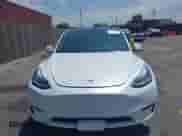 2023 Tesla Model Y Long Range с VIN 7SAYGDEE8PA034371, выставлен на аукционе IAAI как лот 42765729 с пробегом Не указан миль и . История ставок и продаж доступна на DreamBid. Изображение 11.