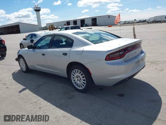 2020 Dodge Charger Police z VIN 2C3CDXKTXLH124217, wystawiony jako IAAI lot #43154620 z przebiegiem 119 464 mil mil oraz . Historia ofert i sprzedaży dostępna na DreamBid. Obrazek 3.