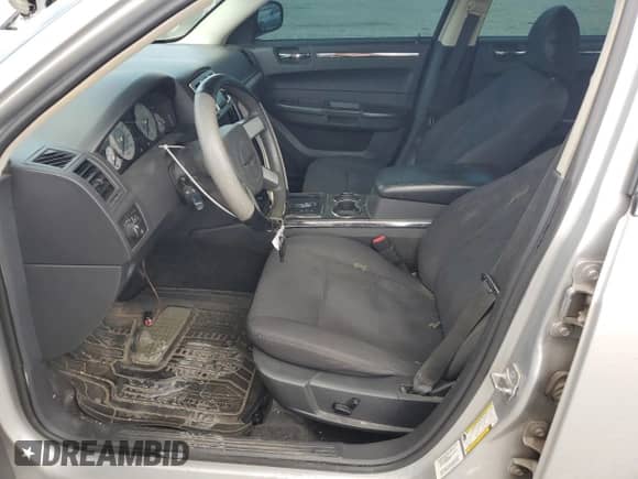 2010 Chrysler 300 Touring с VIN 2C3CA4CD8AH143022, выставлен на аукционе Copart как лот 69796405 с пробегом 77 070 миль миль и Списание • Salvage title. История ставок и продаж доступна на DreamBid. Изображение 7.