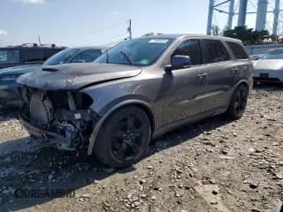 2014 Dodge Durango R/T with VIN 1C4SDJCT8EC307625, listed as a Copart auction lot 71590915 with 178,083 mi miles and Salvage title. Bid and sale history available at DreamBid. Image 1.