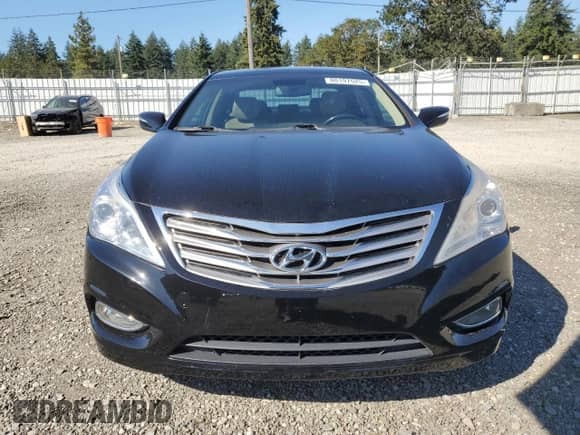 2013 Hyundai Azera с VIN KMHFH4JG9DA268059, выставлен на аукционе Copart как лот 80197525 с пробегом 136 567 миль миль и Списание • Salvage title. История ставок и продаж доступна на DreamBid. Изображение 5.