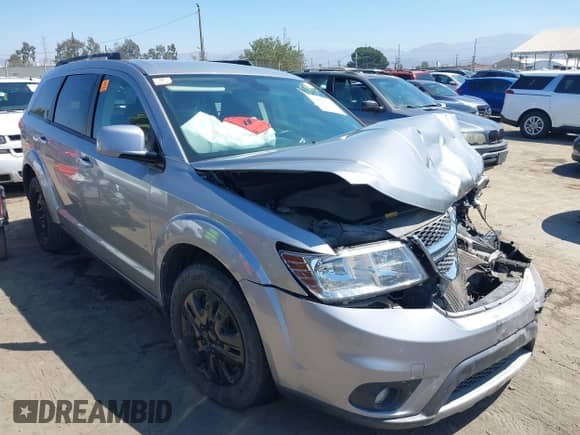 2019 Dodge Journey SE with VIN 3C4PDCBG0KT798004, listed as a IAAI auction lot 43012657 with 74,633 mi miles and . Bid and sale history available at DreamBid. Image 1.