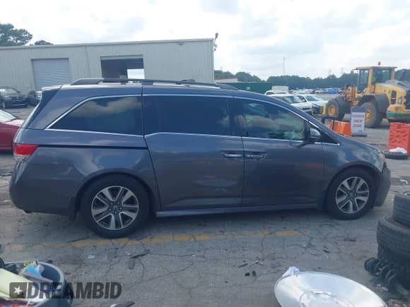 2015 Honda Odyssey Touring Elite с VIN 5FNRL5H98FB099305, выставлен на аукционе IAAI как лот 42880329 с пробегом 203 189 миль миль и . История ставок и продаж доступна на DreamBid. Изображение 13.