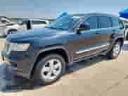 2012 Jeep Grand Cherokee Laredo z VIN 1C4RJEAG4CC258909, wystawiony jako Copart lot #70101885 z przebiegiem 168 332 mil mil oraz Czysty tytuł • Clean title. Historia ofert i sprzedaży dostępna na DreamBid. Obrazek 1.