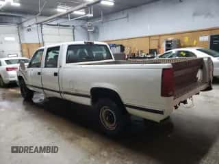 1997 Chevrolet Silverado 3500 z VIN 1GCGC33R9VF031799, wystawiony jako Copart lot #69377024 z przebiegiem 185 024 mil mil oraz Czysty tytuł • Clean title. Historia ofert i sprzedaży dostępna na DreamBid. Obrazek 2.