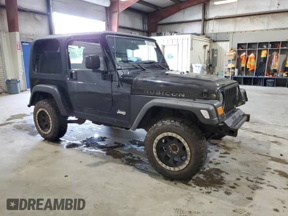 2003 Jeep Wrangler Rubicon с VIN 1J4FA69S13P360267, выставлен на аукционе Copart как лот 62077835 с пробегом 88 278 миль миль и Чистый • Clean title. История ставок и продаж доступна на DreamBid. Изображение 4.
