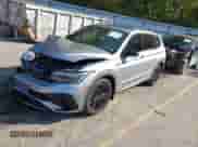 2022 Volkswagen Tiguan SE R-Line Black с VIN 3VV8B7AX0NM015055, выставлен на аукционе IAAI как лот 43229006 с пробегом 26 141 миль миль и . История ставок и продаж доступна на DreamBid. Изображение 18.