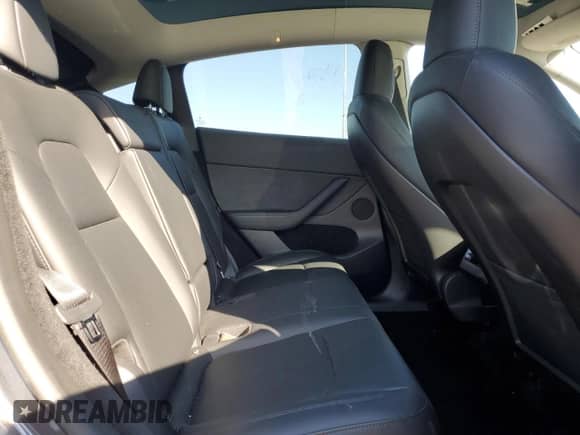 2023 Tesla Model Y Long Range с VIN 7SAYGDEE4PA079582, выставлен на аукционе Copart как лот 80201525 с пробегом 18 840 миль миль и Списание • Salvage title. История ставок и продаж доступна на DreamBid. Изображение 11.