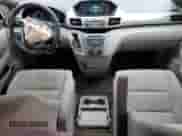 2014 Honda Odyssey LX z VIN 5FNRL5H28EB126388, wystawiony jako Copart lot #70583975 z przebiegiem 148 425 mil mil oraz Szkoda całkowita • Salvage title. Historia ofert i sprzedaży dostępna na DreamBid. Obrazek 8.