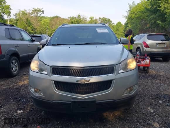 2012 Chevrolet Traverse 1LT z VIN 1GNKVGED9CJ350165, wystawiony jako IAAI lot #42479266 z przebiegiem 210 655 mil mil oraz . Historia ofert i sprzedaży dostępna na DreamBid. Obrazek 12.