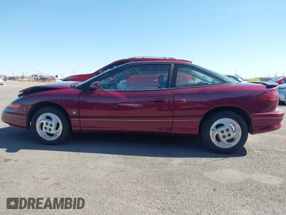 1993 Saturn SC with VIN 1G8ZH1578PZ266037, listed as a IAAI auction lot 42052067 with 62,355 mi miles and . Bid and sale history available at DreamBid. Image 14.