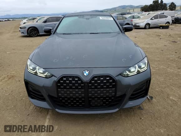 2022 BMW 4 Series M440i xDrive с VIN WBA13AW04NFM02565, выставлен на аукционе Copart как лот 53339975 с пробегом 16 325 миль миль и Списание • Salvage title. История ставок и продаж доступна на DreamBid. Изображение 5.