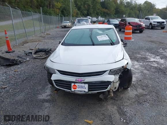 2018 Chevrolet Malibu LS z VIN 1G1ZB5ST7JF277595, wystawiony jako IAAI lot #43289380 z przebiegiem 62 729 mil mil oraz . Historia ofert i sprzedaży dostępna na DreamBid. Obrazek 11.