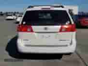 2010 Toyota Sienna XLE с VIN 5TDYK4CC3AS310667, выставлен на аукционе Copart как лот 86077205 с пробегом 184 017 миль миль и Списание • Salvage title. История ставок и продаж доступна на DreamBid. Изображение 6.