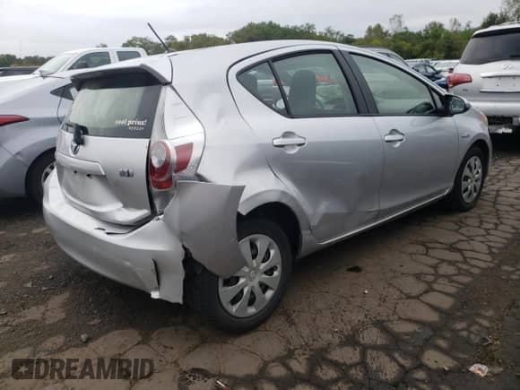 2014 Toyota Prius Two z VIN JTDKDTB38E1066349, wystawiony jako Copart lot #81349295 z przebiegiem Nie podano mil oraz Szkoda całkowita • Salvage title. Historia ofert i sprzedaży dostępna na DreamBid. Obrazek 3.