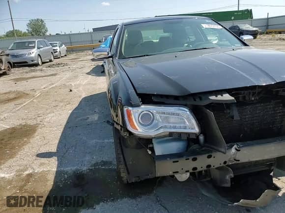 2012 Chrysler 300 Limited с VIN 2C3CCAHG2CH208218, выставлен на аукционе Copart как лот 71873105 с пробегом 126 280 миль миль и Списание • Salvage title. История ставок и продаж доступна на DreamBid. Изображение 14.