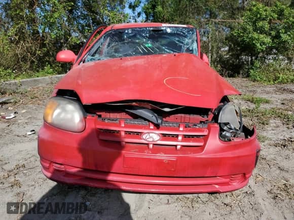 2005 Hyundai Accent GLS с VIN KMHCG45CX5U618473, выставлен на аукционе Copart как лот 76752994 с пробегом Не указан миль и Списание • Salvage title. История ставок и продаж доступна на DreamBid. Изображение 5.