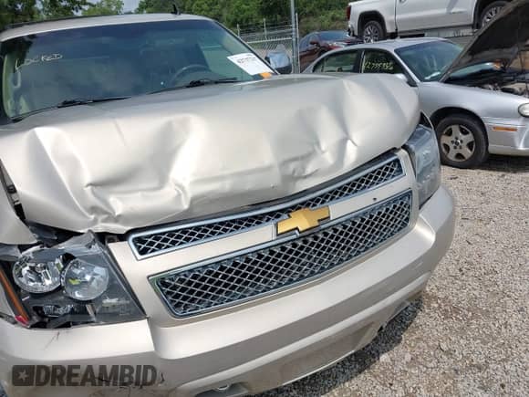 2012 Chevrolet Tahoe LTZ z VIN 1GNSKCE0XCR142165, wystawiony jako IAAI lot #42737217 z przebiegiem 167 857 mil mil oraz . Historia ofert i sprzedaży dostępna na DreamBid. Obrazek 6.