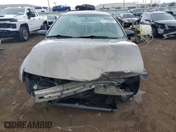 2000 Saturn SL with VIN 1G8ZH528XYZ217346, listed as a Copart auction lot 51164695 with 94,076 mi miles and Salvage title. Bid and sale history available at DreamBid. Image 5.