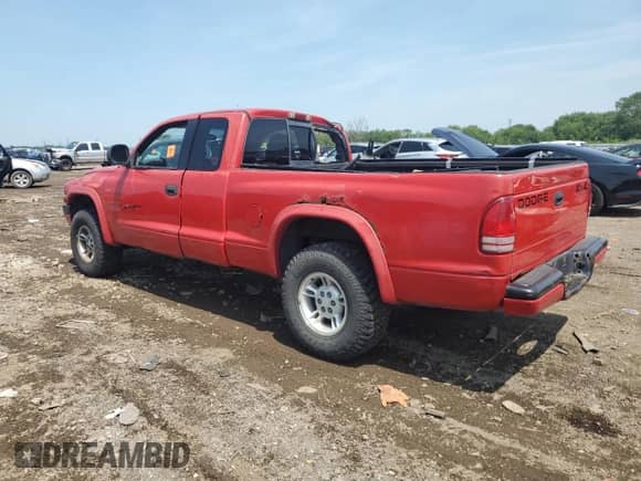 1997 Dodge Dakota с VIN 1B7GG23Y6VS198666, выставлен на аукционе Copart как лот 66134755 с пробегом Не указан миль и Списание • Salvage title. История ставок и продаж доступна на DreamBid. Изображение 2.