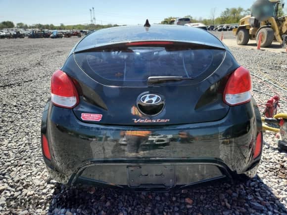 2012 Hyundai Veloster w/Gray Int z VIN KMHTC6AD8CU063025, wystawiony jako Copart lot #81315585 z przebiegiem 166 284 mil mil oraz Szkoda całkowita • Salvage title. Historia ofert i sprzedaży dostępna na DreamBid. Obrazek 6.