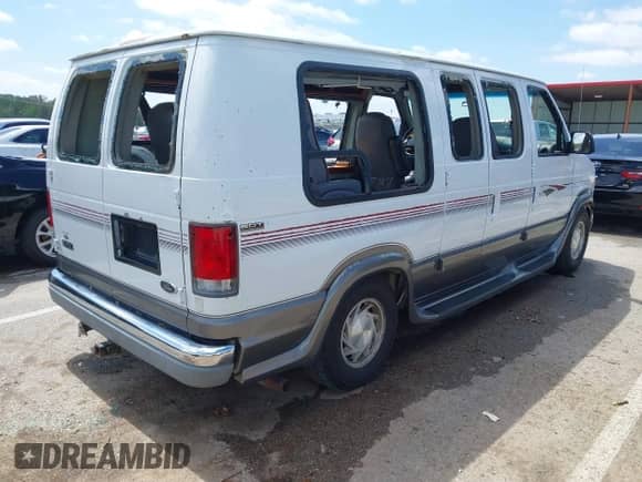 1999 Ford Econoline Cargo Recreational with VIN 1FDRE14L2XHA41059, listed as a IAAI auction lot 42067879 with 149,185 mi miles and . Bid and sale history available at DreamBid. Image 4.