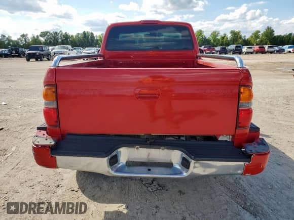 2004 Toyota Tacoma PreRunner with VIN 5TENM92N74Z464206, listed as a Copart auction lot 84038115 with 217,428 mi miles and Salvage title. Bid and sale history available at DreamBid. Image 6.