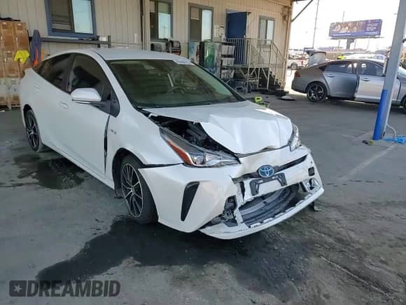 2019 Toyota Prius L Eco с VIN JTDKARFUXK3101195, выставлен на аукционе Copart как лот 82488755 с пробегом 37 486 миль миль и Списание • Salvage title. История ставок и продаж доступна на DreamBid. Изображение 13.