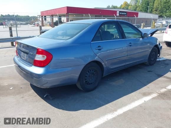 2003 Toyota Camry XLE with VIN 4T1BE32K73U660930, listed as a IAAI auction lot 43162968 with 291,748 mi miles and . Bid and sale history available at DreamBid. Image 4.