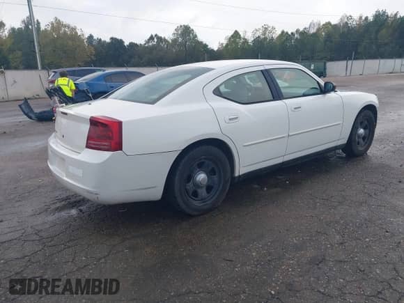 2007 Dodge Charger Police z VIN 2B3KA43H37H797446, wystawiony jako IAAI lot #40813260 z przebiegiem 128 039 mil mil oraz . Historia ofert i sprzedaży dostępna na DreamBid. Obrazek 4.