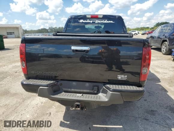 2010 Chevrolet Colorado 1LT z VIN 1GCJTCDEXA8112763, wystawiony jako Copart lot #71072325 z przebiegiem 84 601 mil mil oraz Szkoda całkowita • Salvage title. Historia ofert i sprzedaży dostępna na DreamBid. Obrazek 6.
