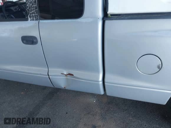 2000 Dodge Dakota with VIN 1B7GL22X6YS526029, listed as a IAAI auction lot 43597002 with 208,306 mi miles and . Bid and sale history available at DreamBid. Image 6.