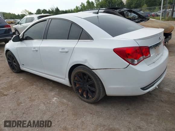 2014 Chevrolet Cruze 2LT with VIN 1G1PE5SB5E7364675, listed as a IAAI auction lot 43183873 with 140,889 mi miles and . Bid and sale history available at DreamBid. Image 3.