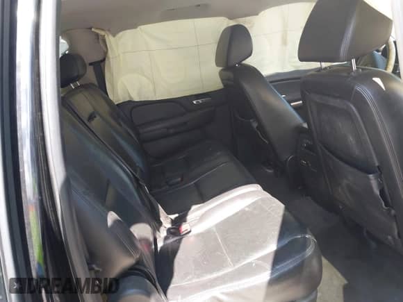 2009 Chevrolet Suburban LTZ z VIN 1GNFK36329R145158, wystawiony jako IAAI lot #43141956 z przebiegiem 336 452 mil mil oraz . Historia ofert i sprzedaży dostępna na DreamBid. Obrazek 8.