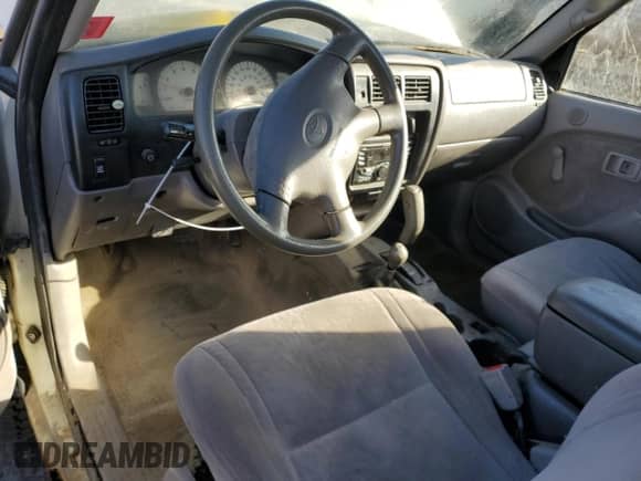 2001 Toyota Tacoma with VIN 5TEPM62N91Z780824, listed as a Copart auction lot 90220975 with 211,375 mi miles and Clean title. Bid and sale history available at DreamBid. Image 8.