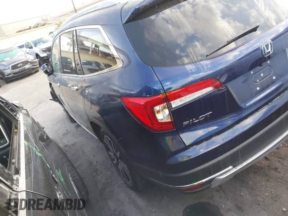 2022 Honda Pilot Touring 8-Passenger z VIN 5FNYF5H95NB017211, wystawiony jako IAAI lot #43010500 z przebiegiem 38 363 mil mil oraz . Historia ofert i sprzedaży dostępna na DreamBid. Obrazek 3.