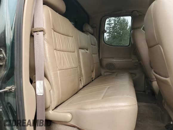 2001 Toyota Tundra Limited z VIN 5TBBT48171S143054, wystawiony jako Copart lot #71740305 z przebiegiem 121 330 mil mil oraz Czysty tytuł • Clean title. Historia ofert i sprzedaży dostępna na DreamBid. Obrazek 10.