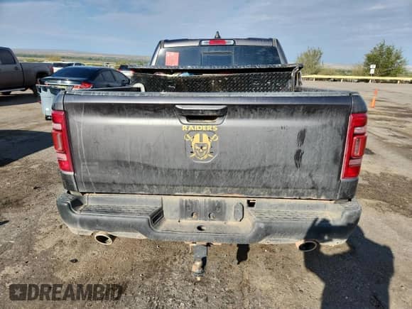 2023 Ram 1500 Laramie z VIN 1C6SRFJT3PN597126, wystawiony jako Copart lot #85916735 z przebiegiem 57 513 mil mil oraz Szkoda całkowita • Salvage title. Historia ofert i sprzedaży dostępna na DreamBid. Obrazek 6.