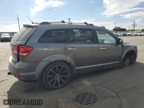 2012 Dodge Journey R/T with VIN 3C4PDDFG3CT147919, listed as a Copart auction lot 70128865 with 135,787 mi miles and Salvage title. Bid and sale history available at DreamBid. Image 3.