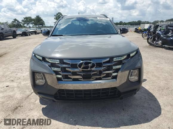2023 Hyundai Santa Cruz Night Edition с VIN 5NTJCDAF6PH063978, выставлен на аукционе Copart как лот 66947895 с пробегом 39 086 миль миль и Списание • Salvage title. История ставок и продаж доступна на DreamBid. Изображение 5.
