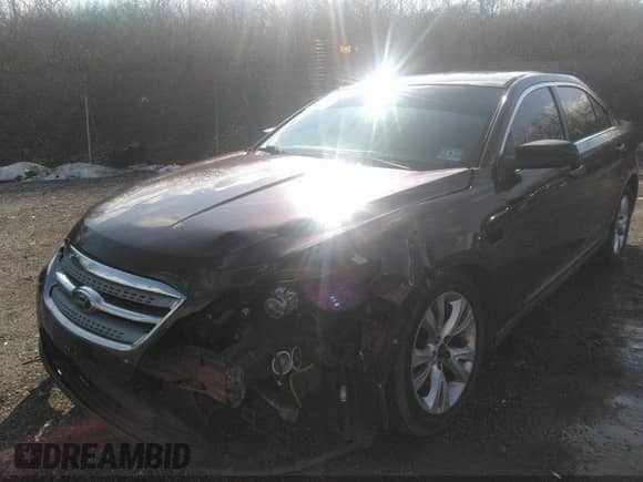 2010 Ford Taurus SEL with VIN 1FAHP2HW8AG135647, listed as a IAAI auction lot 40687874 with 101,000 mi miles and . Bid and sale history available at DreamBid. Image 6.