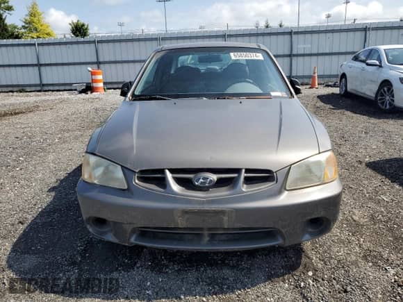 2001 Hyundai Accent GS с VIN KMHCG35C91U131429, выставлен на аукционе Copart как лот 65850374 с пробегом 46 282 миль миль и Чистый • Clean title. История ставок и продаж доступна на DreamBid. Изображение 5.
