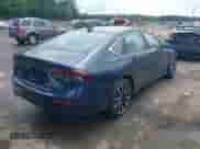 2025 Honda Accord Touring with VIN 1HGCY2F85SA034321, listed as a IAAI auction lot 43047648 with 4,091 mi miles and . Bid and sale history available at DreamBid. Image 4.